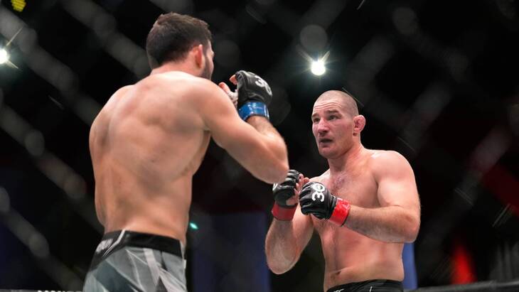 Шон Стрикленд (справа)