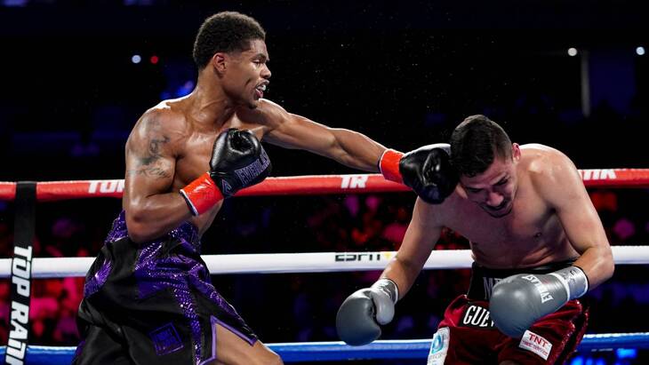 Шакур Стивенсон (слева)