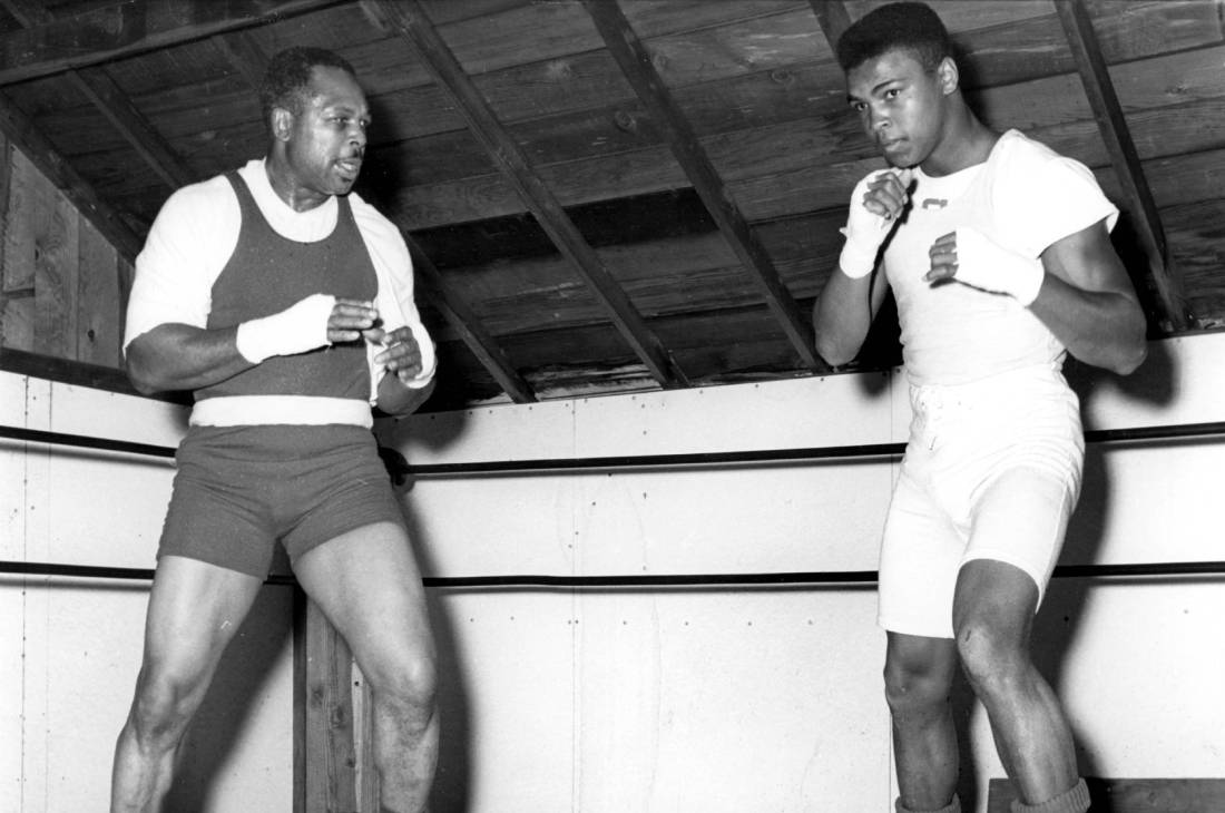 Арчи Мур (слева)