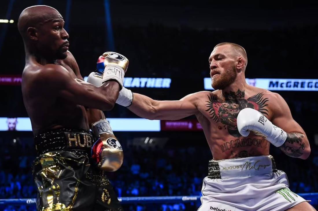 Флойд Мейвезер (слева)