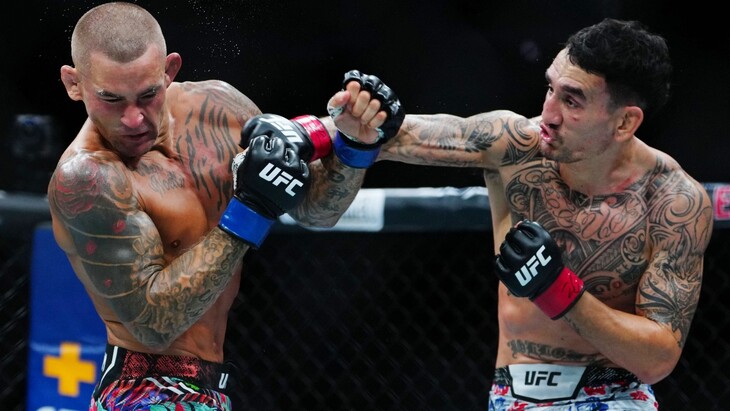 Макс Холлоуэй (справа)