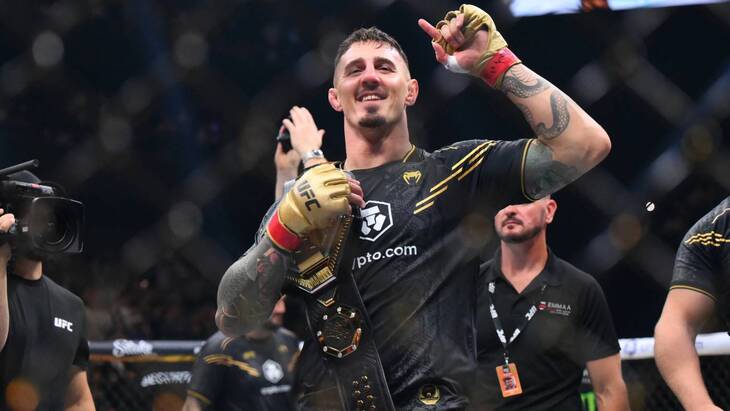 Том Аспиналл