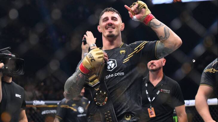 Том Аспиналл