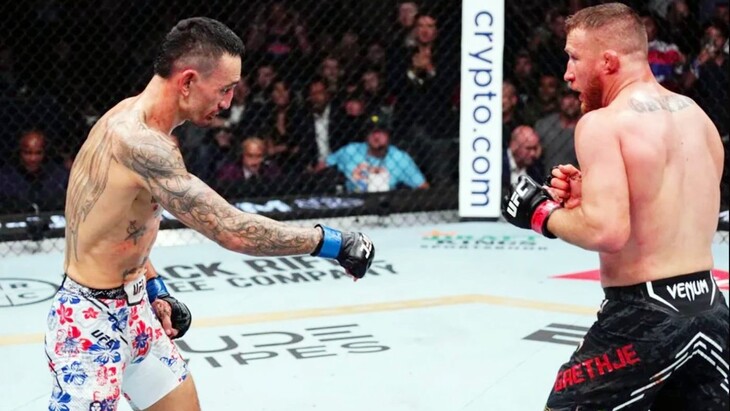 Макс Холлоуэй (слева)