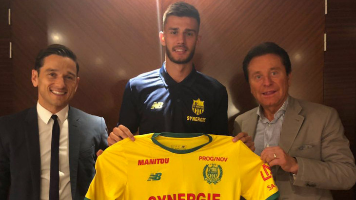 Мэтт Миазга (в центре)