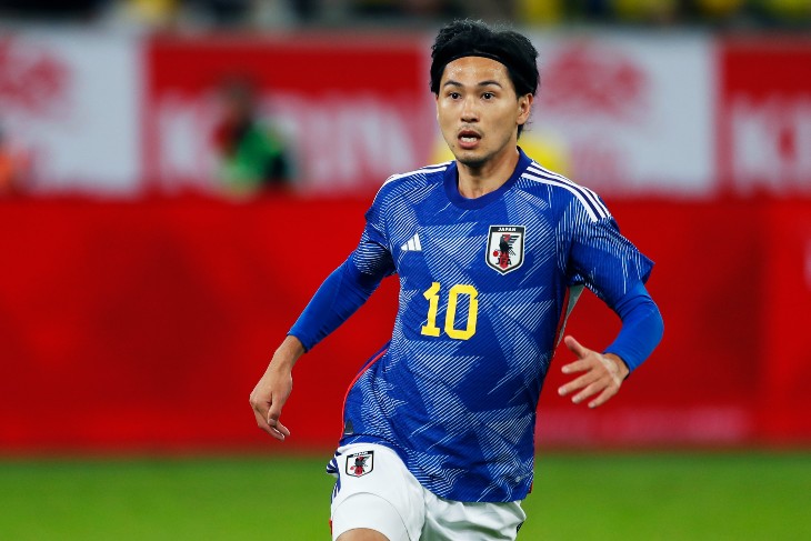 Такуми Минамино