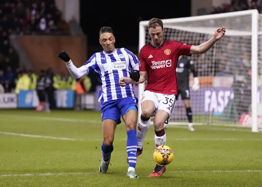 Фрагмент матча Уиган — Манчестер Юнайтед