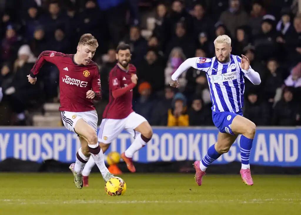 Фрагмент матча Уиган — Манчестер Юнайтед