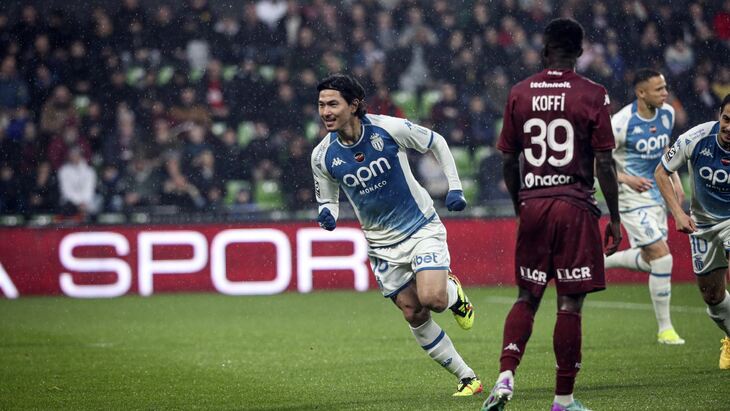 Такуми Минамино