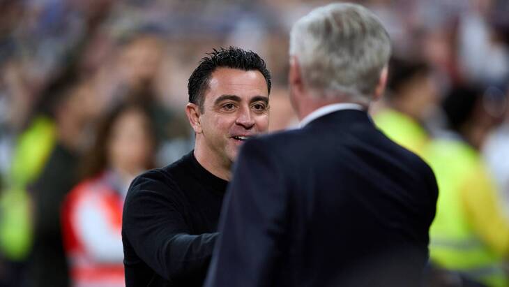 Карло Анчелотти и Хави