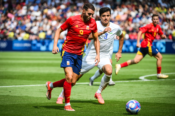 Хусанов в матче с Испанией