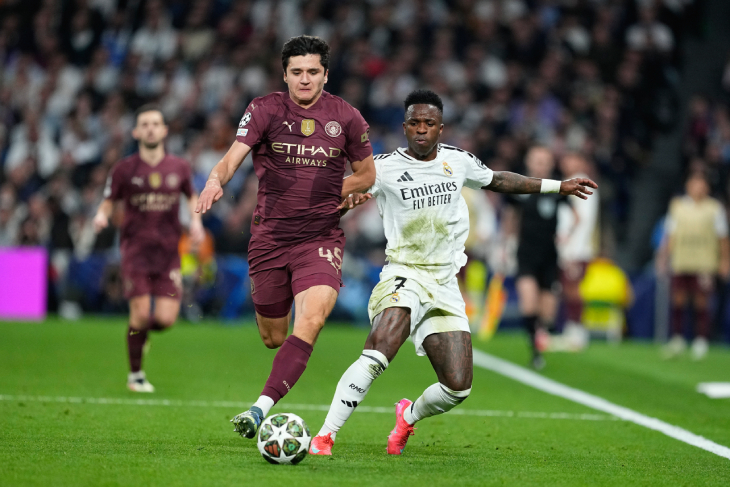 Абдукодир Хусанов  и Винисиус Жуниор