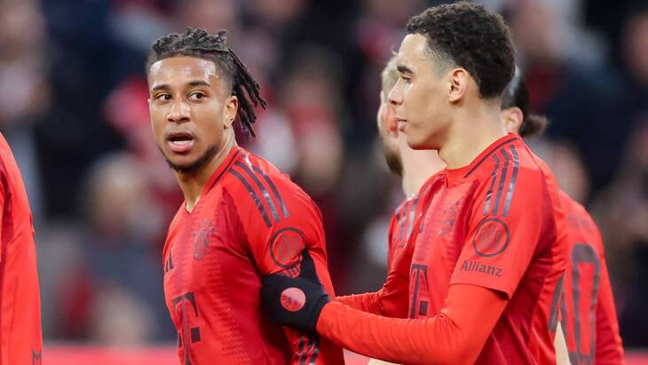 Майкл Олисе (слева)