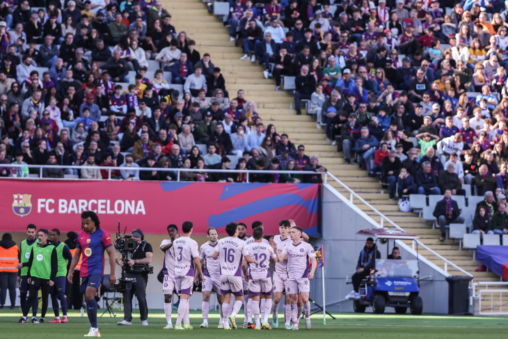 Игроки Жироны празднуют гол