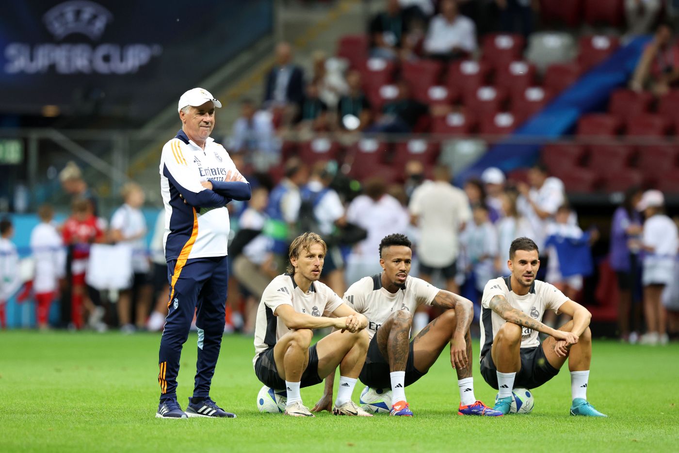 Карло Анчелотти, Лука Модрич, Эдер Милитао и Дани Себальос