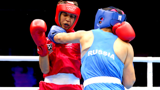 Софья Очигава (в синем)