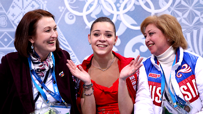 Аделина Сотникова со своими тренерами