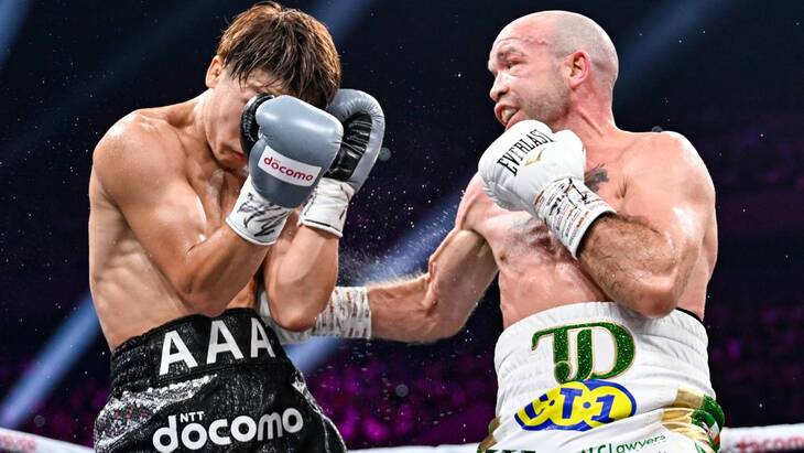 Тиджей Дохени (справа)